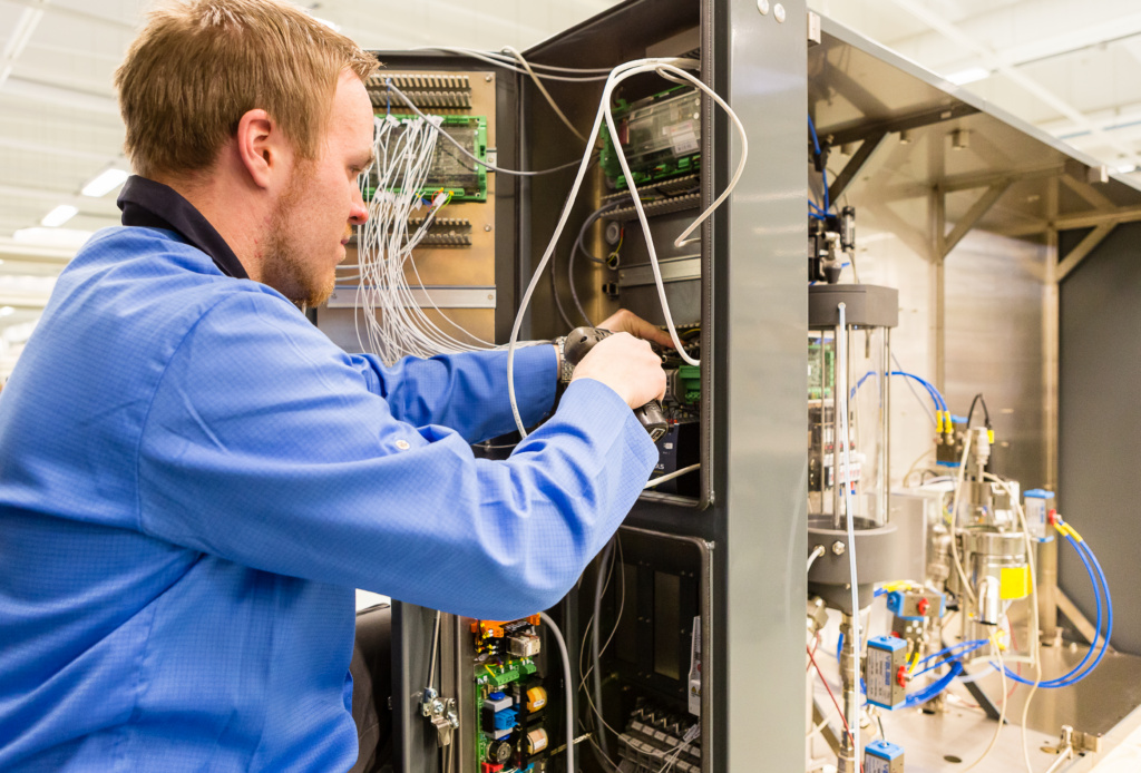 Man working at Scanfil factory