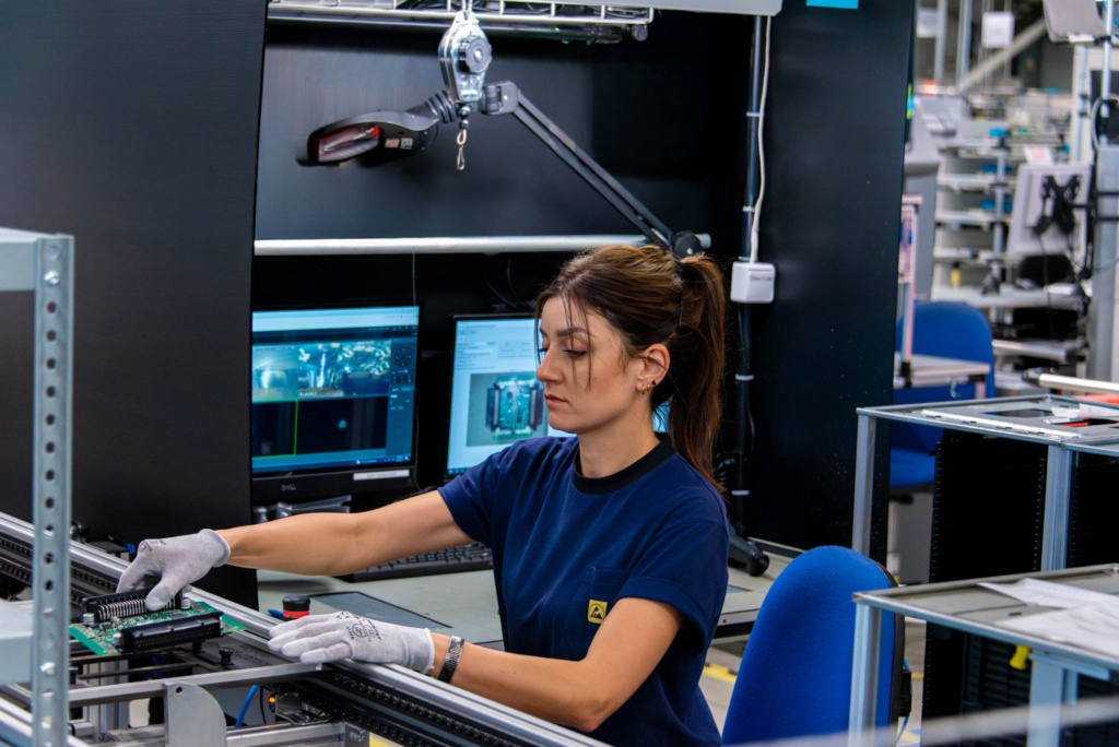 Woman working in Scanfil factory